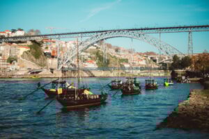 Rabelo boats and Dom Luis I Bridge