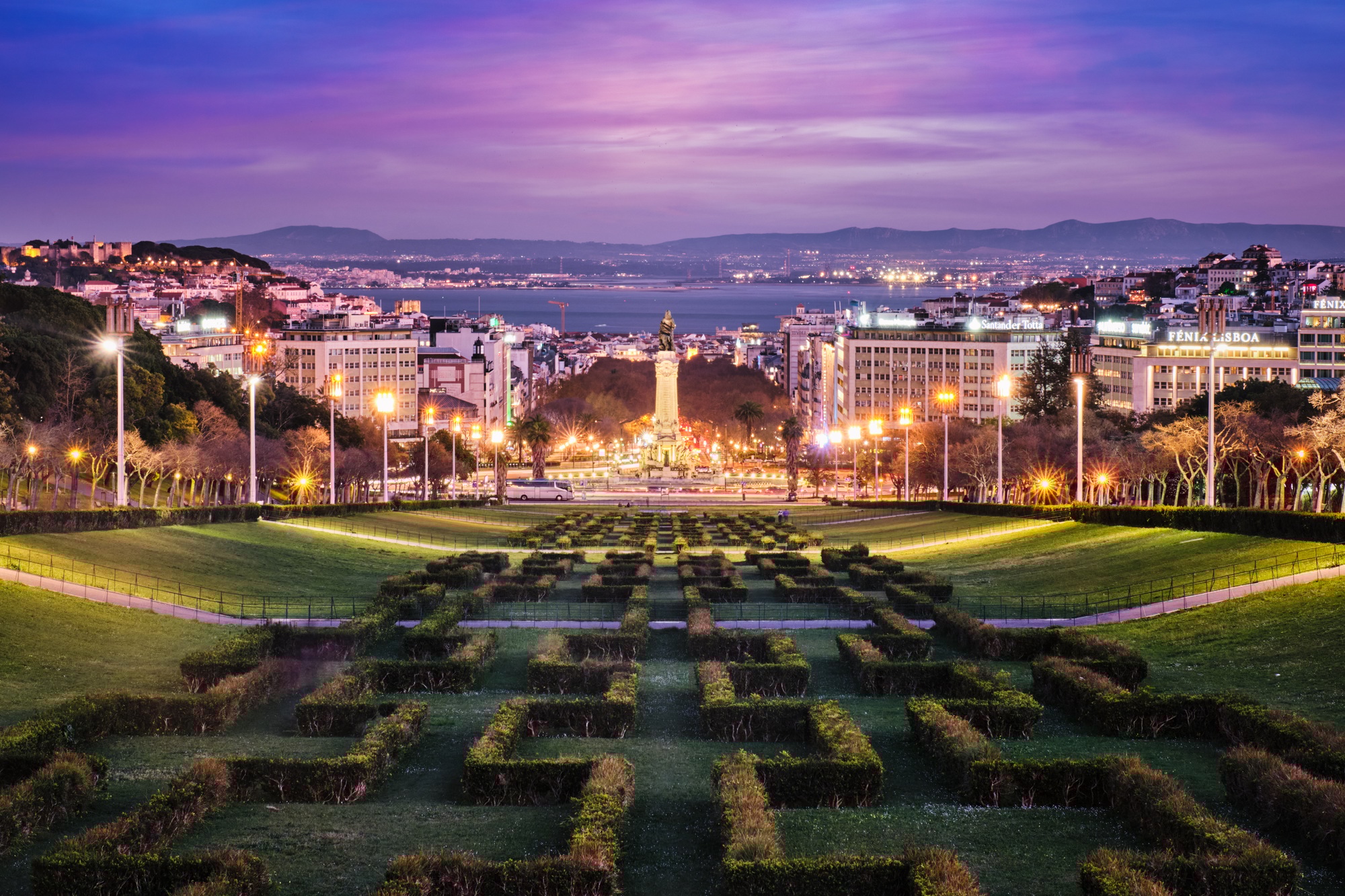 View of Lisbon Marquis of Pombal Square seen from the Eduardo VII Park in night, Portugal
